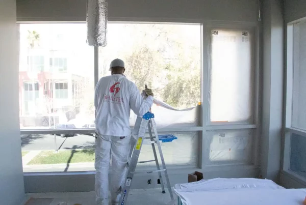 A professional painter preparing to paint the room.