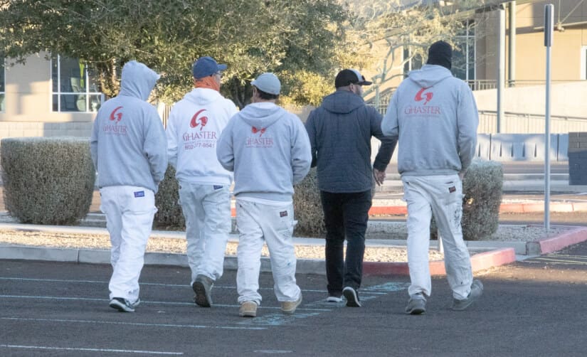 Ghaster Painters with their hoodies