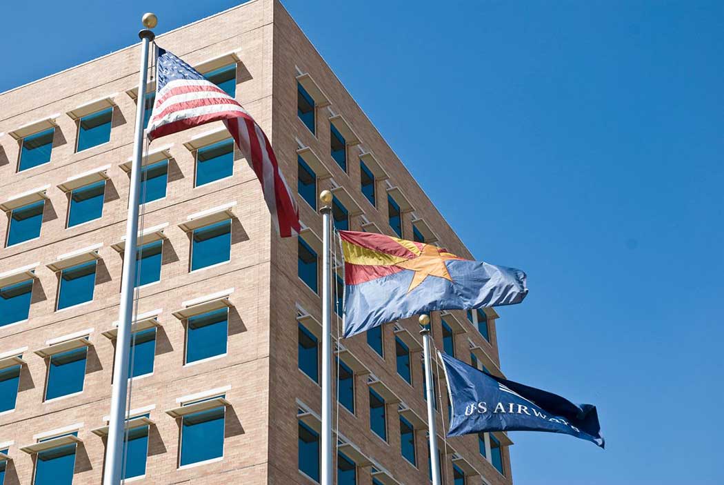 US airways building with flags