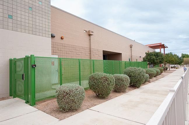 Cecil Shamley Building with Green Fence