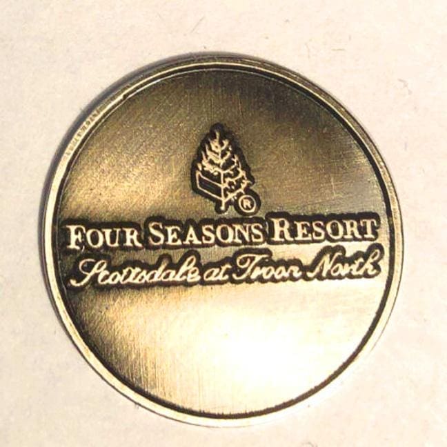 metal pressed logo - Four Seasons Resort